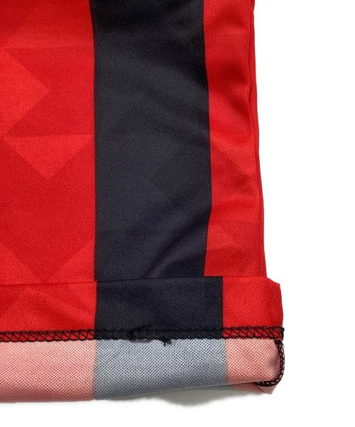 LOTTO（ロット）LOTTO (ロット) サッカーユニフォーム レッド×ブラック サイズ:Mの古着・服飾アイテム