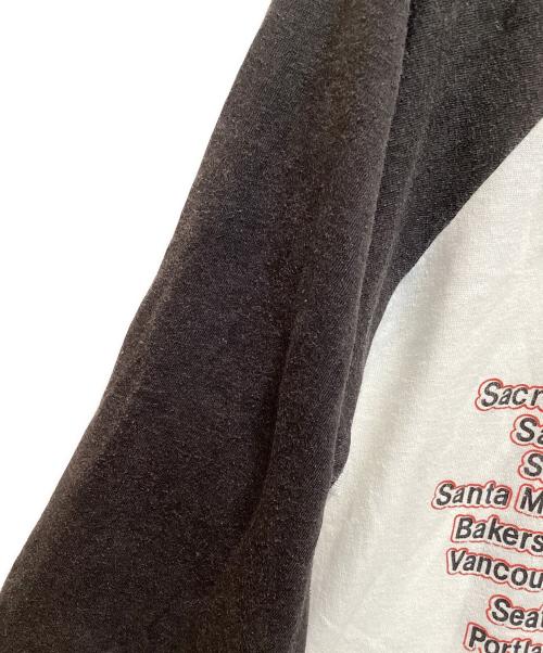 Spring Ford（スプリング フォード）Spring Ford (スプリング フォード) ヴィンテージ ラグランバンドツアーTシャツ ホワイト×ブラック サイズ:XLの古着・服飾アイテム