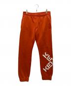 KENZOケンゾー）の古着「ロゴプリントスウェットジョガーパンツ」｜オレンジ