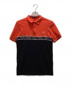 FRED PERRYフレッドペリー）の古着「ロゴテープバイカラーポロシャツ」｜オレンジ×ブラック