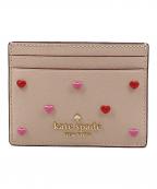 Kate Spadeケイトスペード）の古着「スモールハートスタッズスリムカードケース」｜ピンク