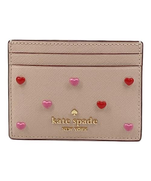 Kate Spade（ケイトスペード）Kate Spade (ケイトスペード) スモールハートスタッズスリムカードケース ピンクの古着・服飾アイテム
