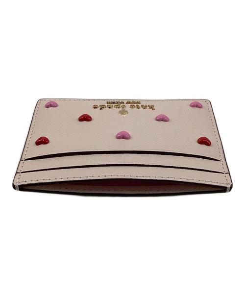 Kate Spade（ケイトスペード）Kate Spade (ケイトスペード) スモールハートスタッズスリムカードケース ピンクの古着・服飾アイテム