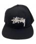 stussy（ステューシー）の古着「ストックロゴ スナップバックキャップ」｜ブラック