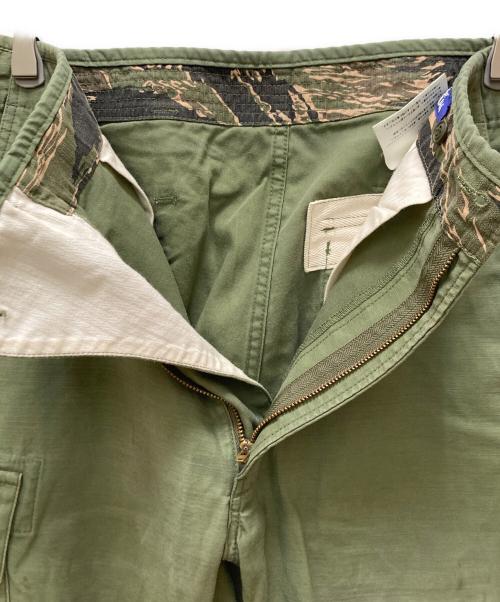 COMME des GARCONS JUNYA WATANABE MAN（コム デ ギャルソン ジュンヤ ワタナベ マン）COMME des GARCONS JUNYA WATANABE MAN (コム デ ギャルソン ジュンヤ ワタナベ マン) タイガーカモ切替カーゴパンツ カーキ サイズ:XSの古着・服飾アイテム