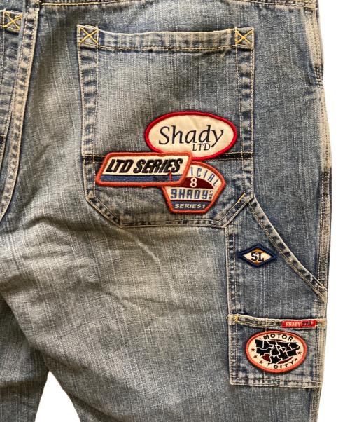 Shady Ltd.（シェイディ・エル・ティー・ディー）Shady Ltd. (シェイディ・エル・ティー・ディー) ヴィンテージワッペンバギーデニム ブルー サイズ: Lの古着・服飾アイテム