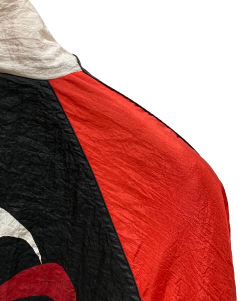 NIKE（ナイキ）NIKE (ナイキ) ヴィンテージ風車ロゴプリントジャケット レッド×ブラック サイズ:Ⅼの古着・服飾アイテム