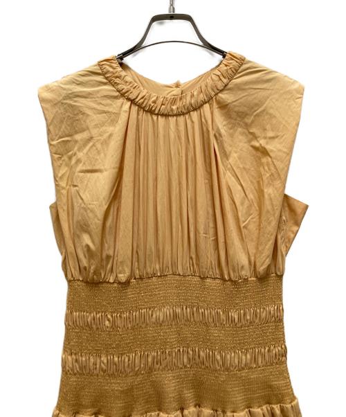 emmi atelier（エミアトリエ）emmi atelier (エミアトリエ) シャーリングフレアーワンピース オレンジの古着・服飾アイテム