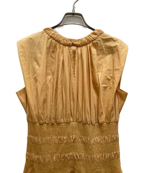 emmi atelier（エミアトリエ）emmi atelier (エミアトリエ) シャーリングフレアーワンピース オレンジの古着・服飾アイテム