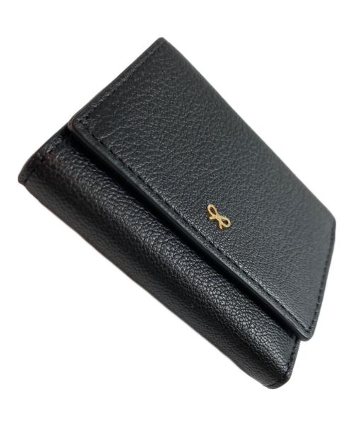 ANYA HINDMARCH（アニヤ・ハインドマーチ）ANYA HINDMARCH (アニヤ・ハインドマーチ) ミニ・トライフォールド・ウォレット ブラックの古着・服飾アイテム