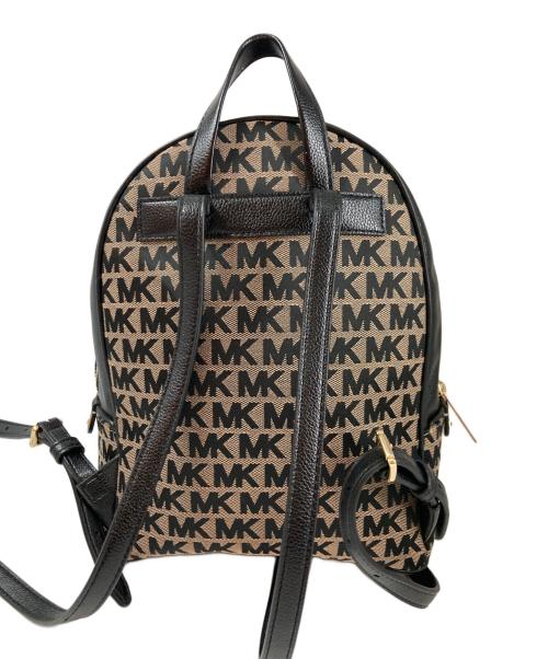 MICHAEL KORS（マイケル・コース）MICHAEL KORS (マイケル・コース) アディナミディアム ロゴジャガードバックパック ベージュの古着・服飾アイテム