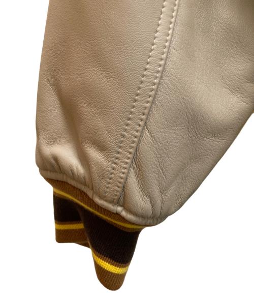 STABRIDGE（スタブリッジ）STABRIDGE (スタブリッジ) AVIREX (アヴィレックス) コラボラムレザーヴァーシティージャケット イエロー×ベージュ サイズ:Ⅼの古着・服飾アイテム