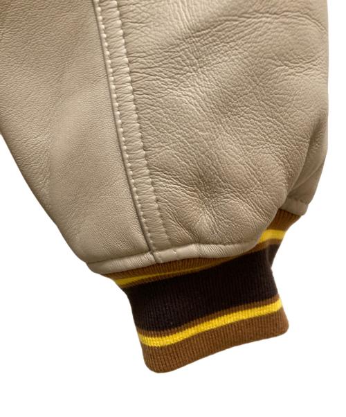 STABRIDGE（スタブリッジ）STABRIDGE (スタブリッジ) AVIREX (アヴィレックス) コラボラムレザーヴァーシティージャケット イエロー×ベージュ サイズ:Ⅼの古着・服飾アイテム