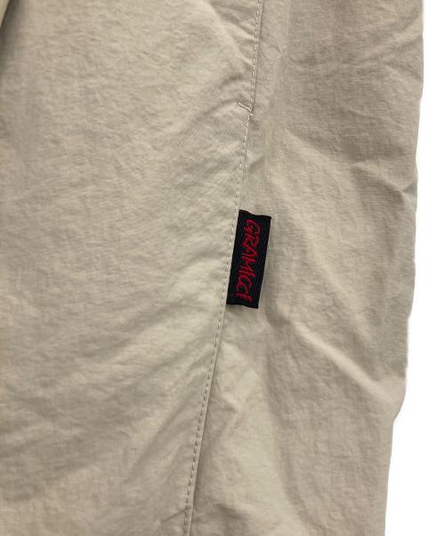 GRAMICCI（グラミチ）GRAMICCI (グラミチ) 耐久撥水 ナイロン フレア パンツ ベージュ サイズ:Mの古着・服飾アイテム