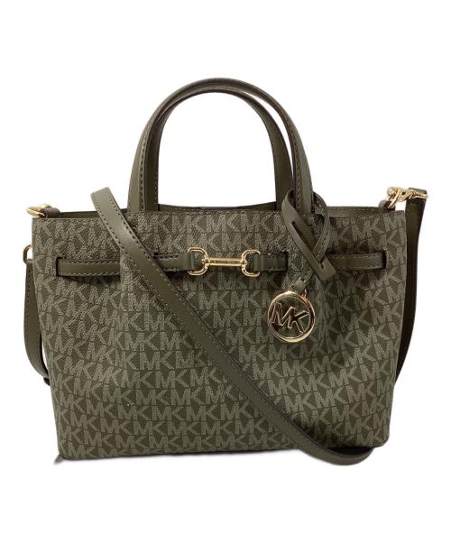 MICHAEL KORS（マイケル・コース）MICHAEL KORS (マイケル・コース) CARSON エンボスロゴ センタージップ サッチェル スモール ベージュの古着・服飾アイテム