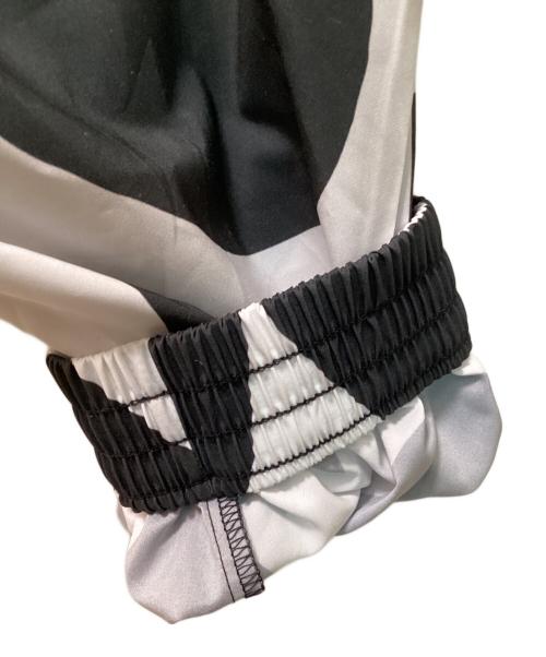 adidas（アディダス）adidas (アディダス) marimekko (マリメッコ) カフ ウーブントラックパンツ ブラック サイズ:Ｌ 未使用品の古着・服飾アイテム