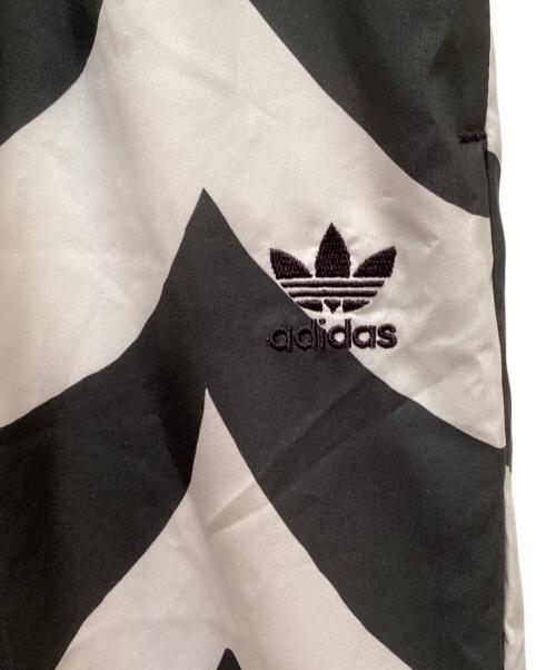 adidas（アディダス）adidas (アディダス) marimekko (マリメッコ) カフ ウーブントラックパンツ ブラック サイズ:Ｌ 未使用品の古着・服飾アイテム