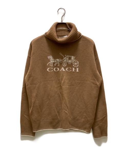 COACH（コーチ）COACH (コーチ) オーバーサイズド ホース アンド キャリッジ タートルネック ベージュ サイズ:Mの古着・服飾アイテム