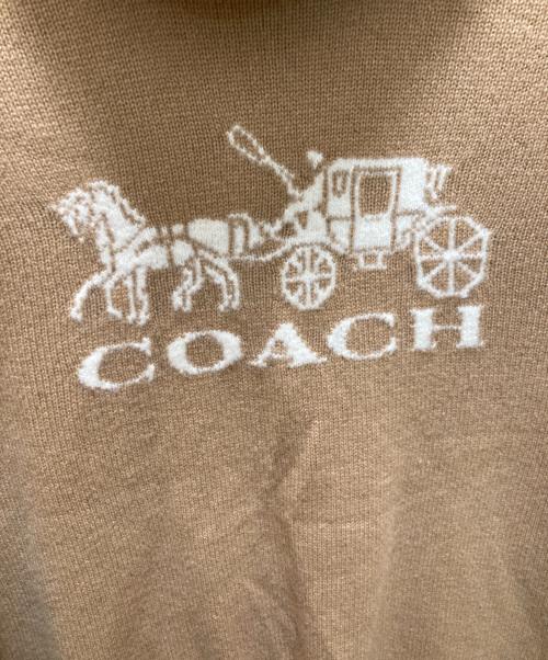 COACH（コーチ）COACH (コーチ) オーバーサイズド ホース アンド キャリッジ タートルネック ベージュ サイズ:Mの古着・服飾アイテム