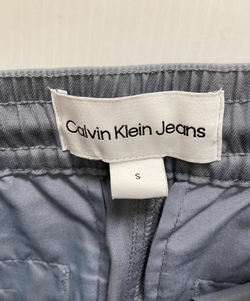 Calvin Klein Jeans（カルバンクラインジーンズ）Calvin Klein Jeans (カルバンクラインジーンズ) ロゴ ウーブン ハーフパンツ ブルー サイズ:Sの古着・服飾アイテム
