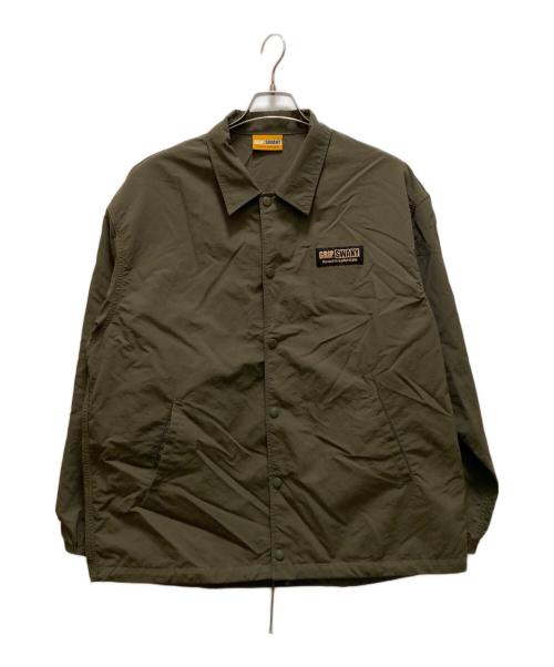 GRIP SWANY（グリップスワニー）GRIP SWANY (グリップスワニー) ロゴプリントコーチジャケット カーキ サイズ:Lの古着・服飾アイテム