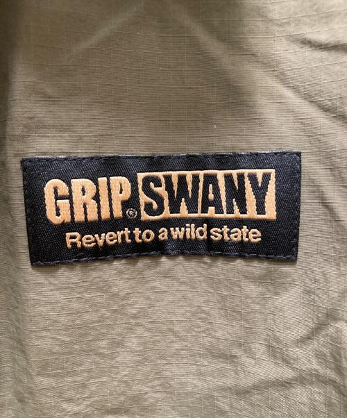 GRIP SWANY（グリップスワニー）GRIP SWANY (グリップスワニー) ロゴプリントコーチジャケット カーキ サイズ:Lの古着・服飾アイテム