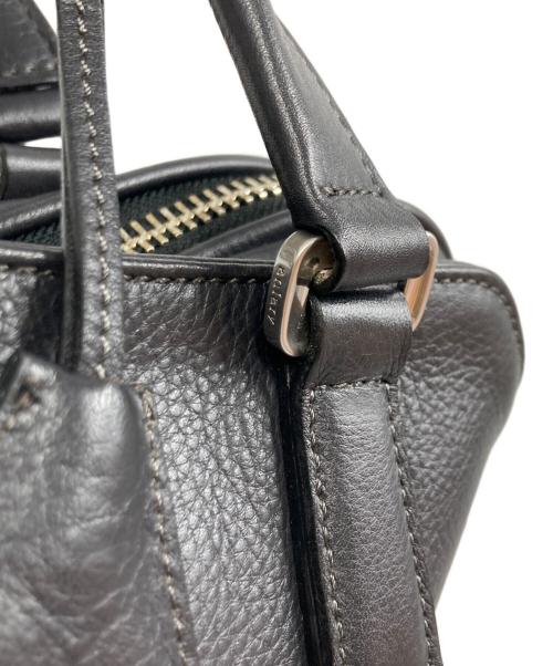 aniary（アニアリ）aniary (アニアリ) 裏地カモフラ Bレザーブリーフケース ネイビーの古着・服飾アイテム