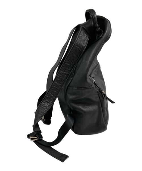 TAZUNE（タズネ）TAZUNE (タズネ) 裏地レオパード ラウンドジップバックパック ブラックの古着・服飾アイテム