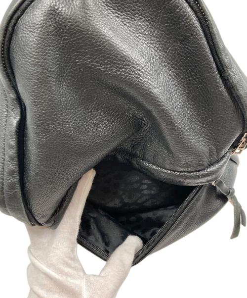 TAZUNE（タズネ）TAZUNE (タズネ) 裏地レオパード ラウンドジップバックパック ブラックの古着・服飾アイテム