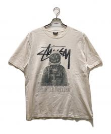 stussy（ステューシー）の古着「SPACEMAN 8ボールロゴTシャツ」｜ホワイト