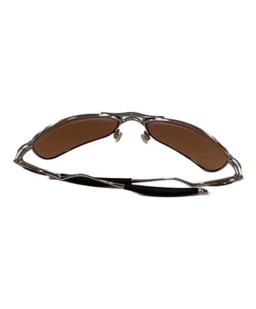 OAKLEY（オークリー）OAKLEY (オークリー) クロスヘアーサングラス ブラウンの古着・服飾アイテム