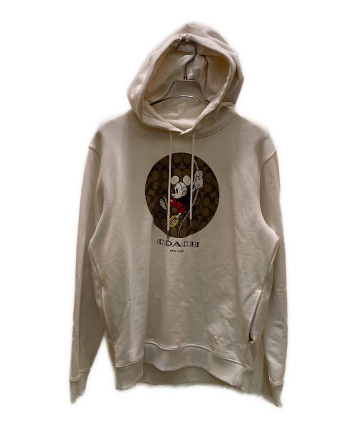 COACH（コーチ）COACH (コーチ) Disney (ディズニー) コラボシグネチャープルオーバーパーカー アイボリー サイズ:Ⅼの古着・服飾アイテム
