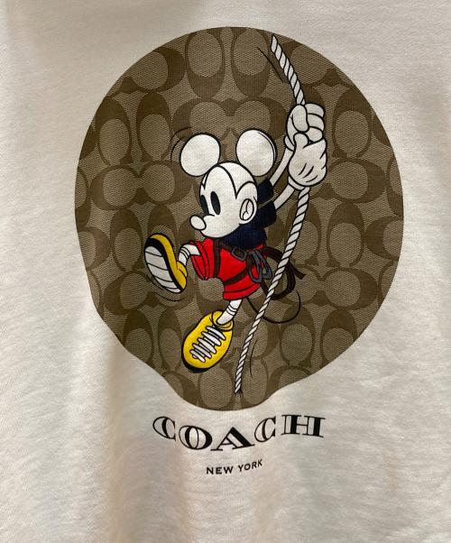 COACH（コーチ）COACH (コーチ) Disney (ディズニー) コラボシグネチャープルオーバーパーカー アイボリー サイズ:Ⅼの古着・服飾アイテム