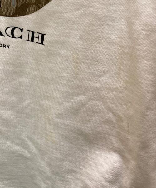 COACH（コーチ）COACH (コーチ) Disney (ディズニー) コラボシグネチャープルオーバーパーカー アイボリー サイズ:Ⅼの古着・服飾アイテム