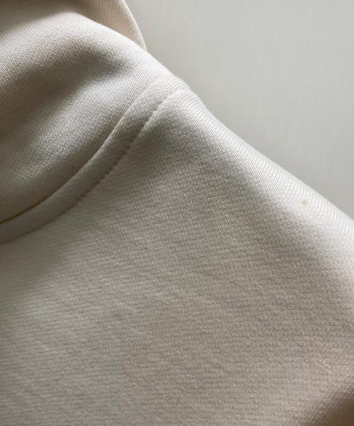 COACH（コーチ）COACH (コーチ) Disney (ディズニー) コラボシグネチャープルオーバーパーカー アイボリー サイズ:Ⅼの古着・服飾アイテム