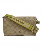 COACHコーチ）の古着「アンナフォルドオーバークロスボディクラッチ」｜黄緑×ベージュ