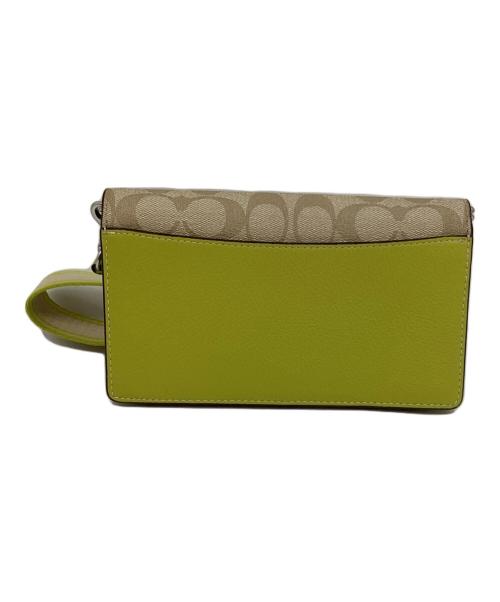 COACH（コーチ）COACH (コーチ) アンナフォルドオーバークロスボディクラッチ 黄緑×ベージュの古着・服飾アイテム