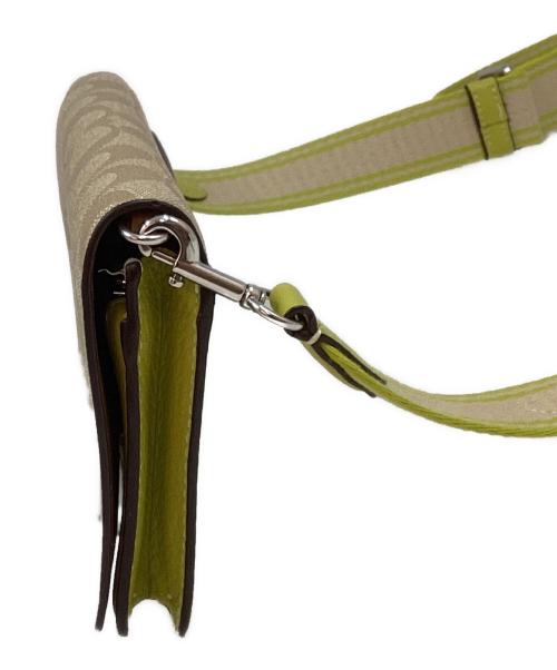 COACH（コーチ）COACH (コーチ) アンナフォルドオーバークロスボディクラッチ 黄緑×ベージュの古着・服飾アイテム