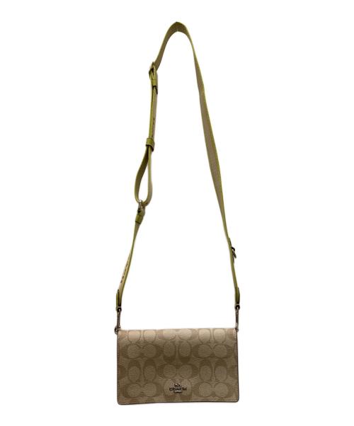COACH（コーチ）COACH (コーチ) アンナフォルドオーバークロスボディクラッチ 黄緑×ベージュの古着・服飾アイテム