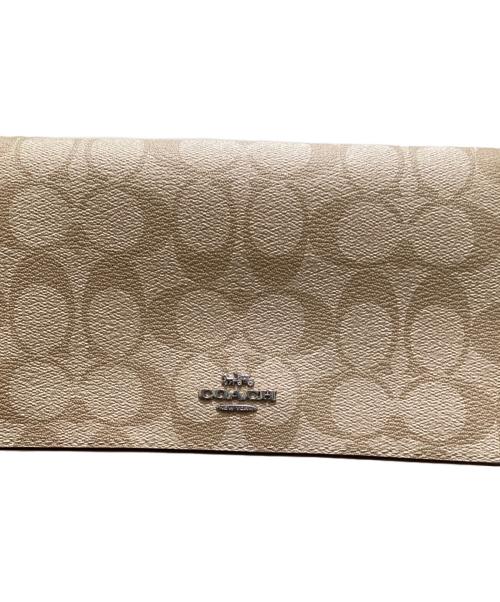 COACH（コーチ）COACH (コーチ) アンナフォルドオーバークロスボディクラッチ 黄緑×ベージュの古着・服飾アイテム