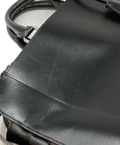 aniary（アニアリ）aniary (アニアリ) 裏地カモ柄 3層レザーブリーフケース ブラックの古着・服飾アイテム