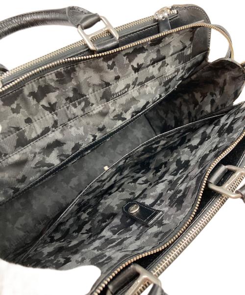 aniary（アニアリ）aniary (アニアリ) 裏地カモ柄 3層レザーブリーフケース ブラックの古着・服飾アイテム