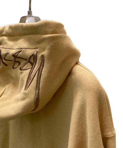 stussy（ステューシー）stussy (ステューシー) バアックアップリケ プルオーバーパーカー ベージュ サイズ:Ⅼの古着・服飾アイテム