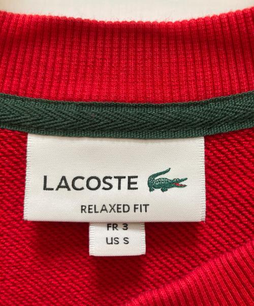 LACOSTE（ラコステ）LACOSTE (ラコステ) フロッキーオーバルクロッククルーネックスウェット レッド サイズ:Sの古着・服飾アイテム