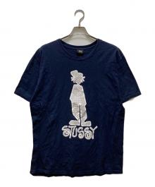 stussy（ステューシー）の古着「シャドーマン プリントTシャツ」｜ネイビー×ホワイト