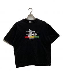 stussy（ステューシー）の古着「ヴィンテージ ラスタ ルーツ プリントTシャツ」｜ブラック