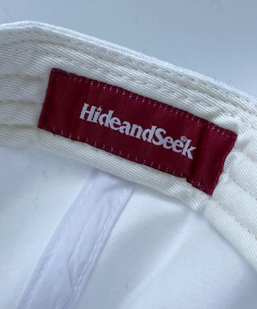 HIDE AND SEEK（ハイドアンドシーク）HIDE AND SEEK (ハイドアンドシーク) ONE OZ BASEBALL CAP ホワイトの古着・服飾アイテム