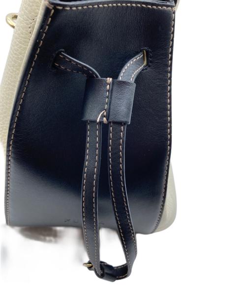 FURLA（フルラ）FURLA (フルラ) ミアステラ ミニバケット ブラック×ホワイトの古着・服飾アイテム