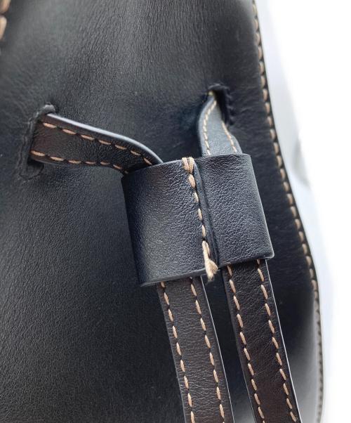 FURLA（フルラ）FURLA (フルラ) ミアステラ ミニバケット ブラック×ホワイトの古着・服飾アイテム
