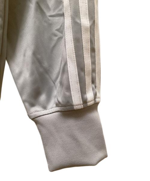 adidas（アディダス）adidas (アディダス) アディカラー クラシック ファイヤーバード ルーズ トラックトップ グレー サイズ:Sの古着・服飾アイテム